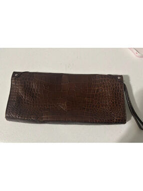 Brown croc-embossed leather clutch and wristlet by Claudia Firenze